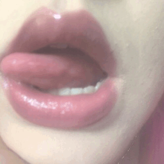 Shiny pink lipstick gloss