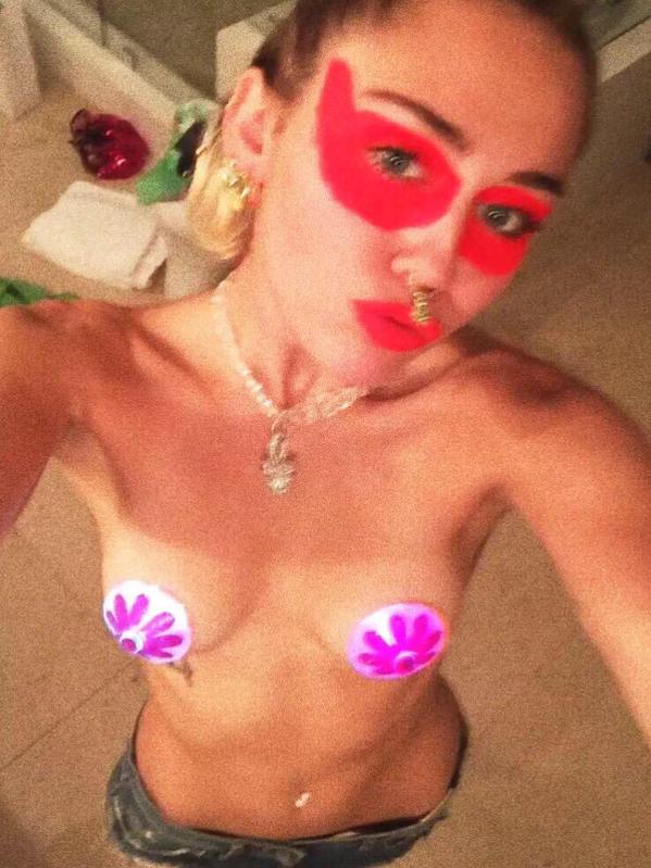Miley cyrus goes nuts posing
