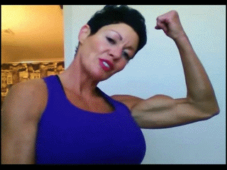 Muscle girl showing awesome biceps