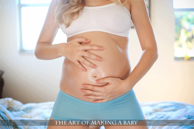 Alien womans pregnant belly
