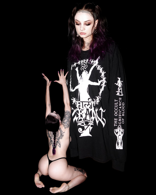 Gothic girl performing satanic rituals