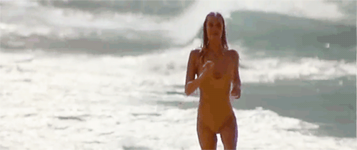 Tanned beauty topless beach filmed