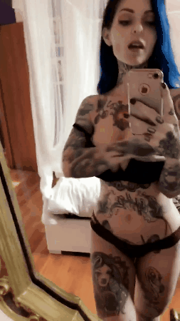 Tattoos of hot naked porn girl on guy